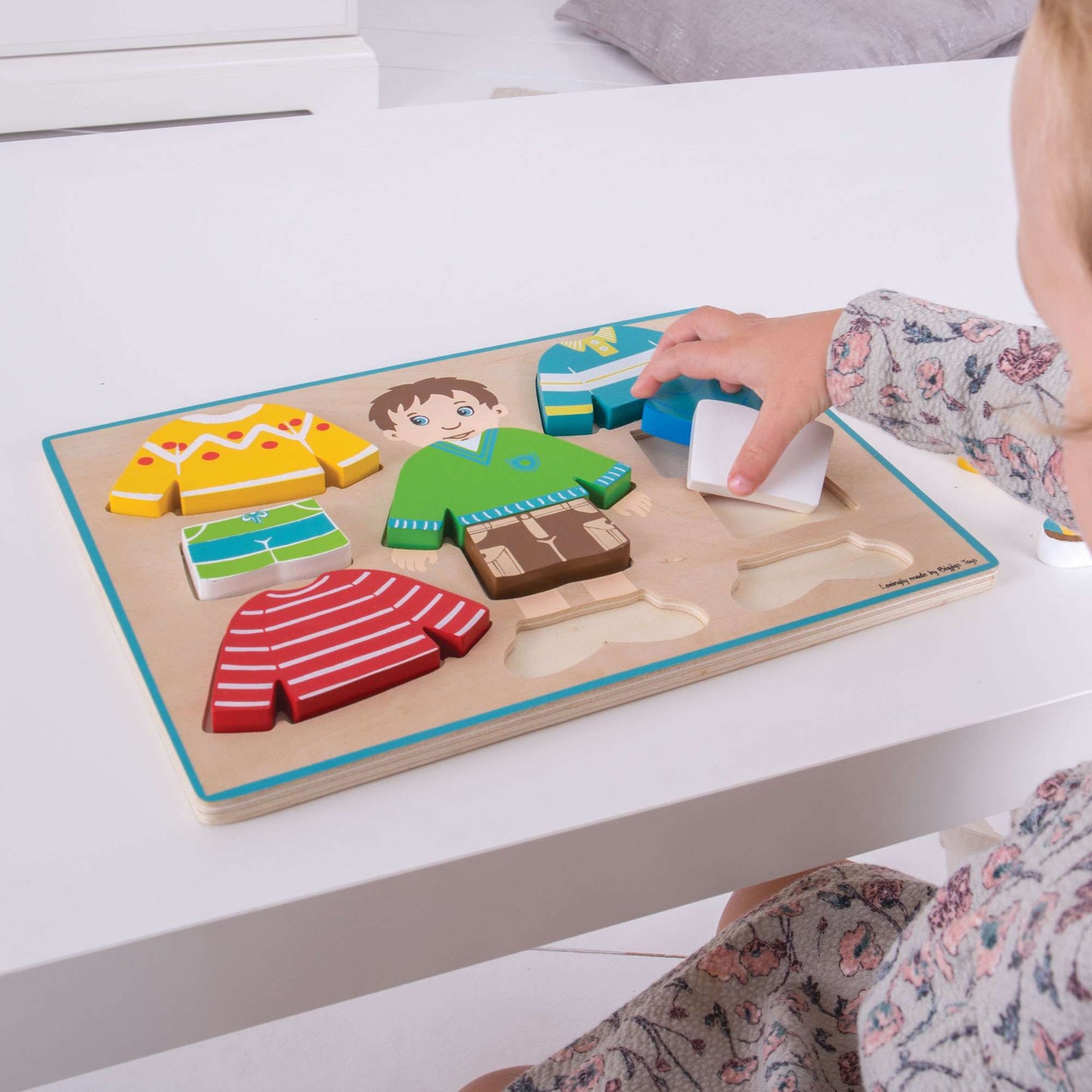 Anzieh-Junge-Puzzle