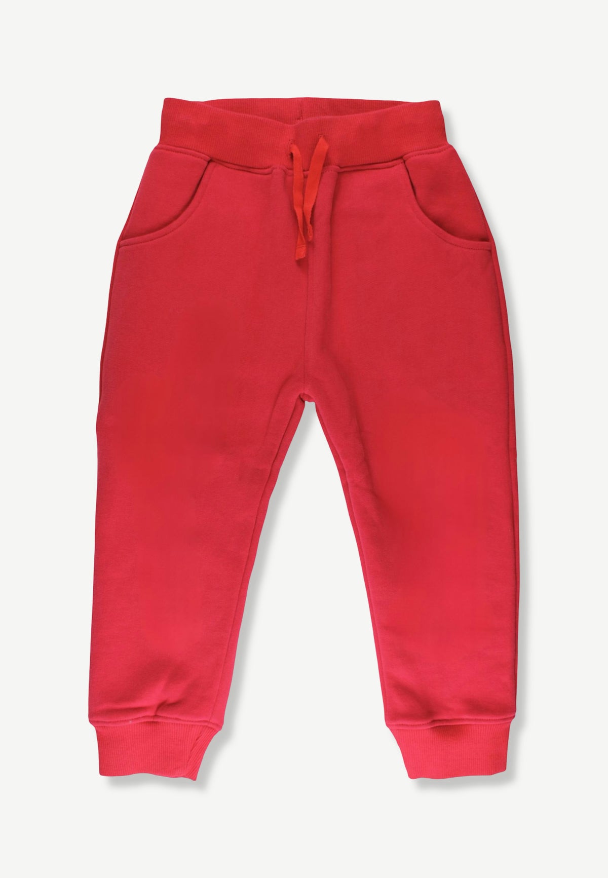 Red sweatpants with an elastic waistband, matching drawstring, side pockets, and ribbed ankle cuffs, shown flat on a light gray background.