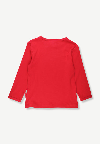 A bright red long-sleeve t-shirt shown from the back, laid flat against a light off-white background.