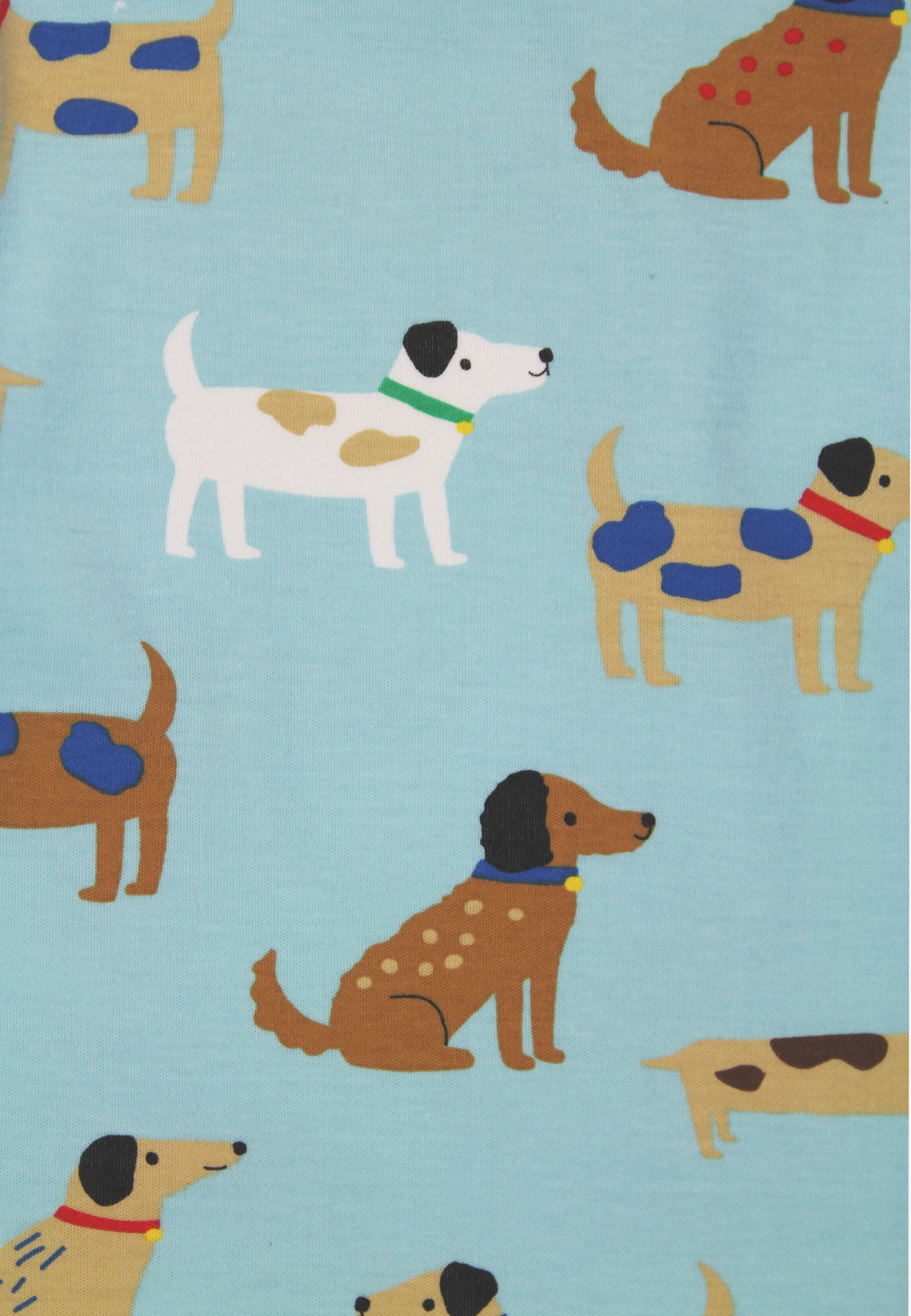 Close-up of light blue, featuring an all-over print of cartoon dogs in various breeds and colors