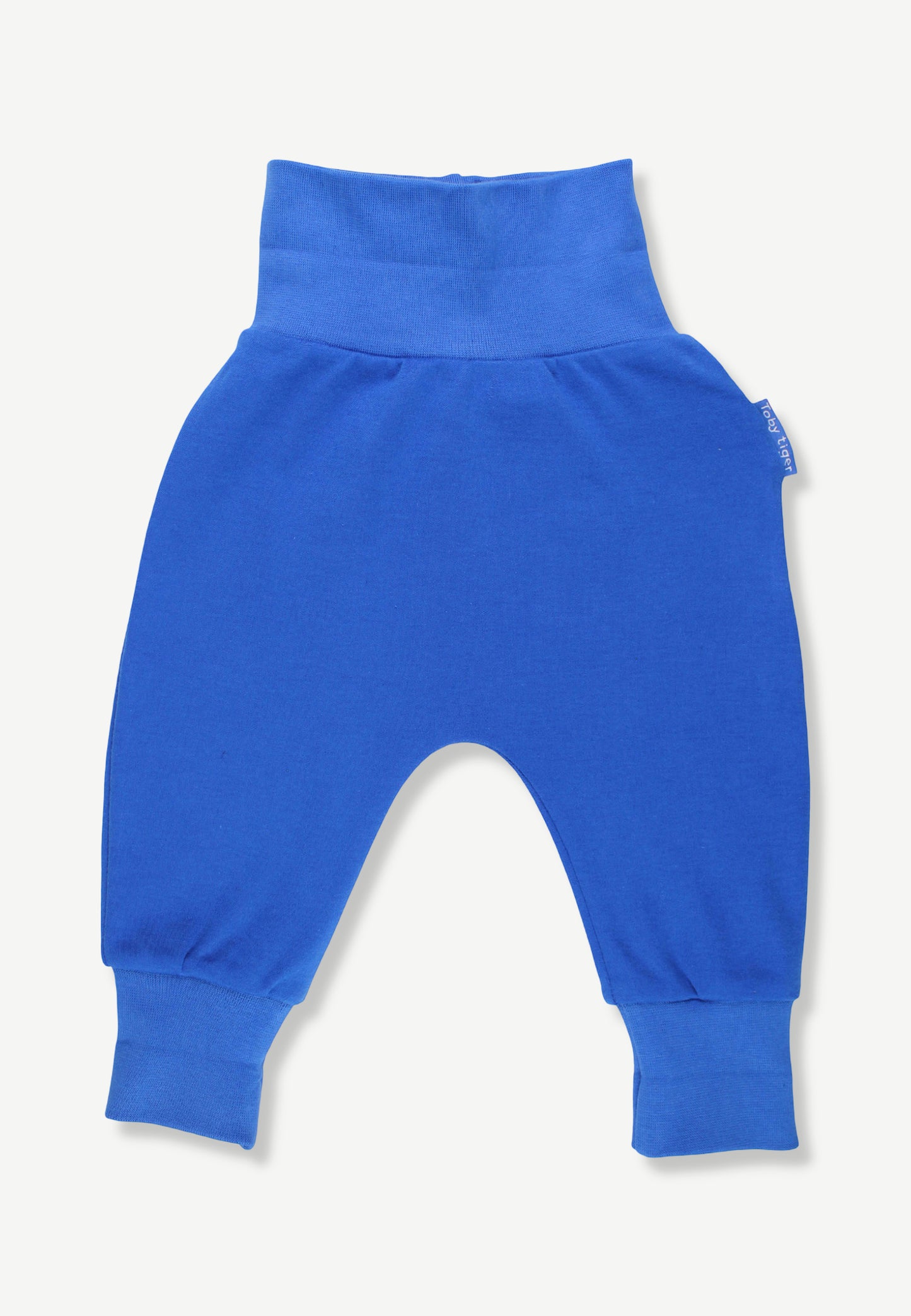 Bright blue baby jogger pants with a wide elastic waistband and ribbed ankle cuffs, shown flat on a light off-white background.