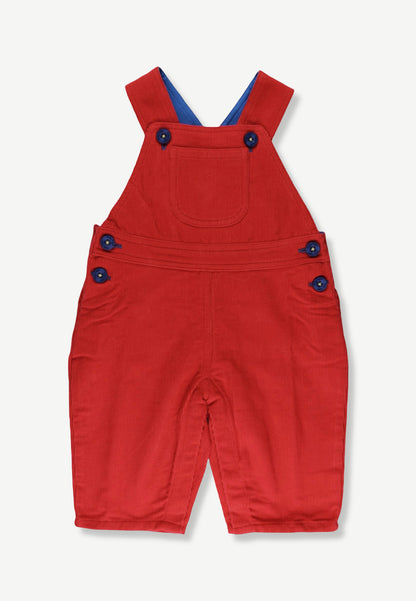 A red corduroy baby overall romper with blue buttons and a blue inner lining, shown flat on a light gray background.