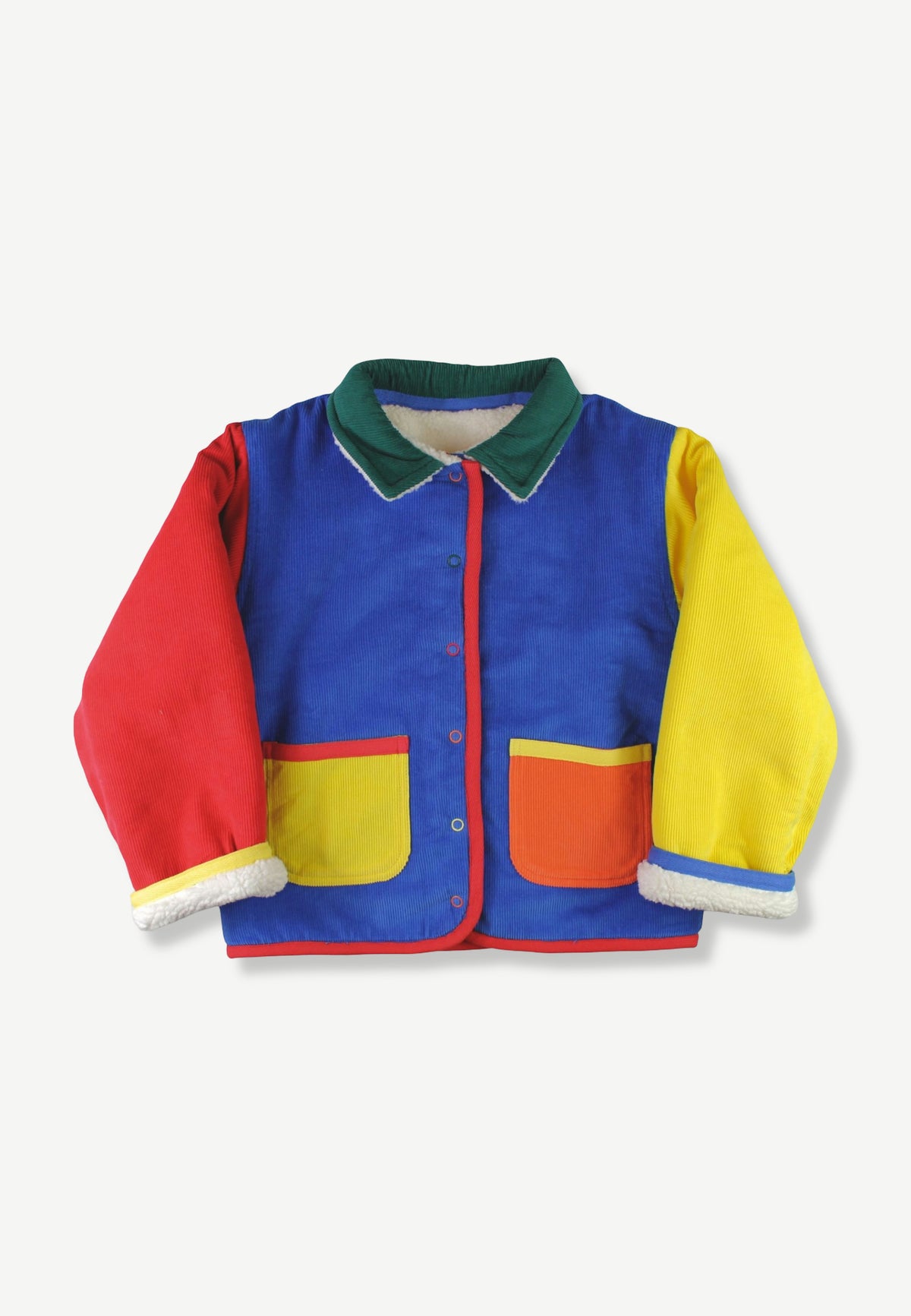 A colorful children's jacket with a blue body, red and yellow sleeves, a green collar, and yellow front pockets, shown on a light gray background.