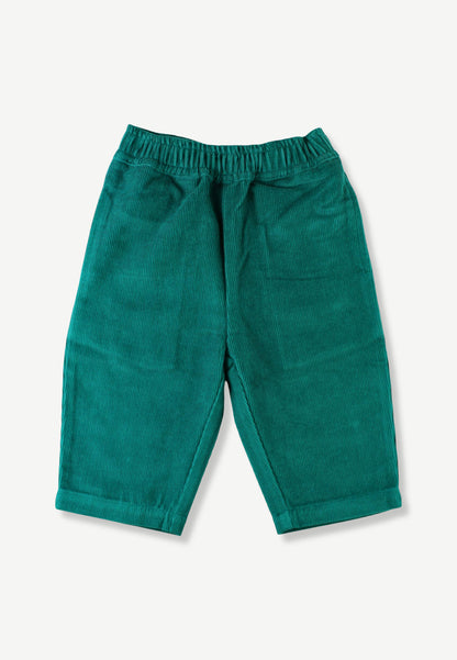 A pair of toddler's green corduroy pants with an elastic waistband, laid flat on a light off-white background.