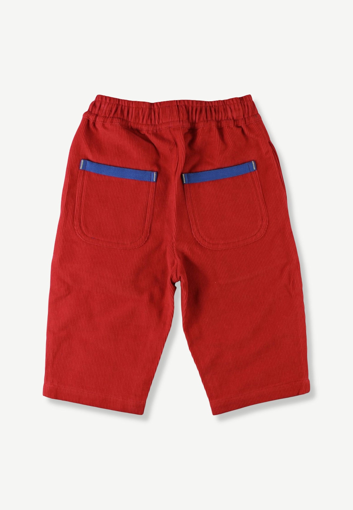 Red cotton pants with an elastic waistband and two back pockets featuring blue stripe accents, shown from the back on a light gray background.